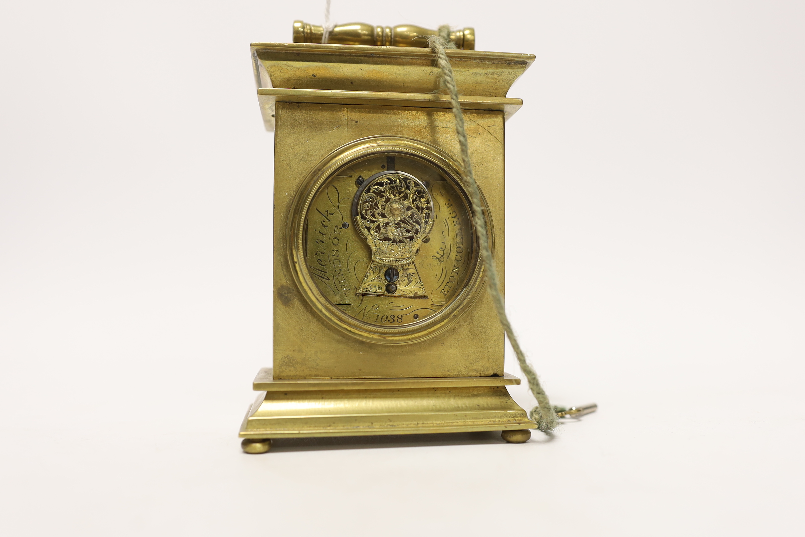 A brass carriage timepiece with machine turned face, signed to the backplate Merrick, Windsor, 11.5cm high